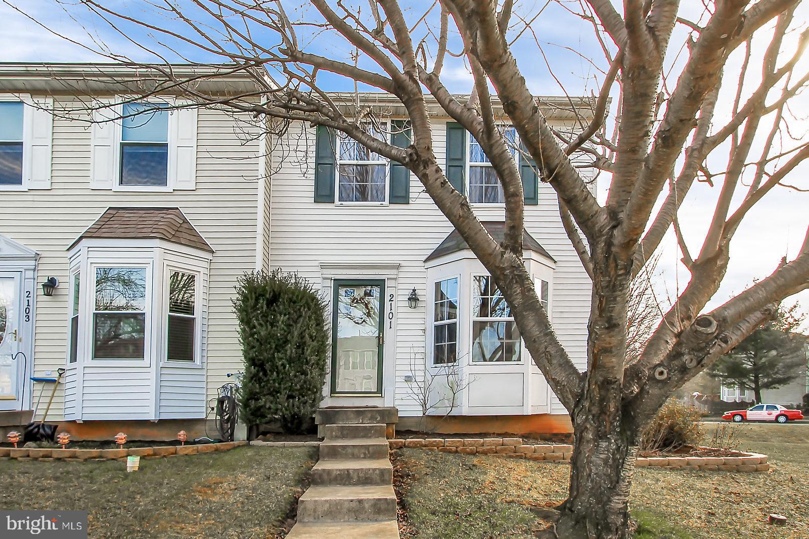 2101 Riding Crop Way Baltimore, MD 21244 - Photo 1 of 36 a front view of a house with a yard