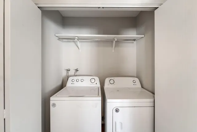 a kitchen with a stove a sink and a refrigerator