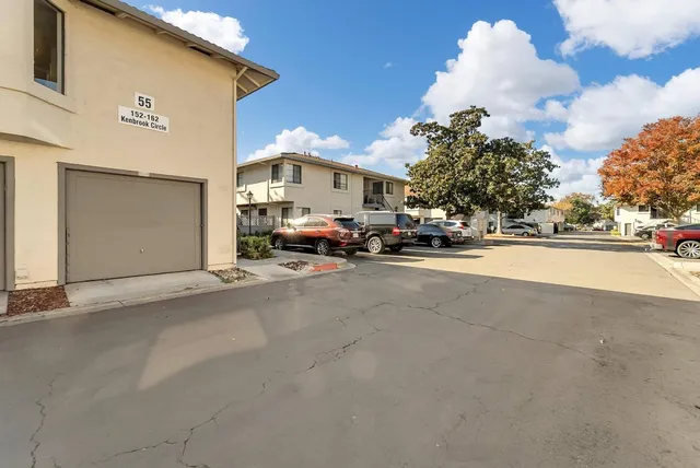 a view of swimming pool with trees