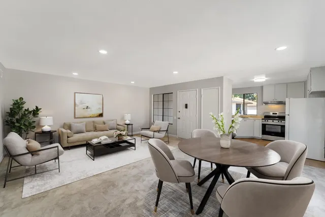 a view of a dining room with furniture