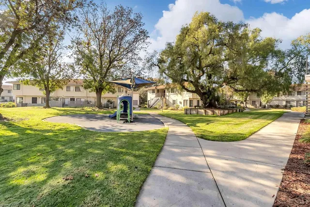 a view of a house with wooden stairs