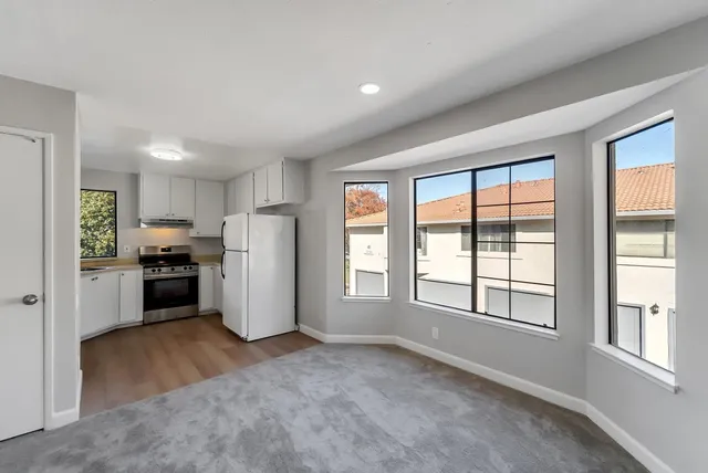 an empty room with windows