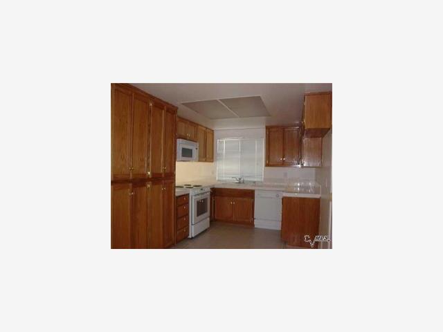 3340 Joshua Way Modesto, CA 95355 - Photo 5 of 7 a upper view of a living room with a sink and cabinets