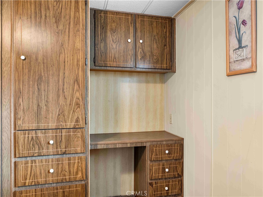 11414 Serra Road, Unit 46 Apple Valley, CA 92308 - Photo 16 of 22 a bathroom with a sink and a mirror