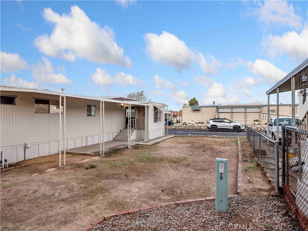 11414 Serra Road, Unit 46 Apple Valley, CA 92308 - Photo 20 of 22 a view of a backyard