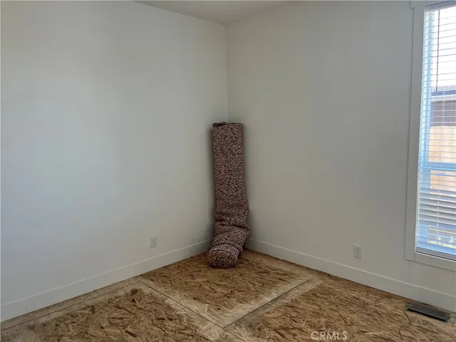 an empty room with window