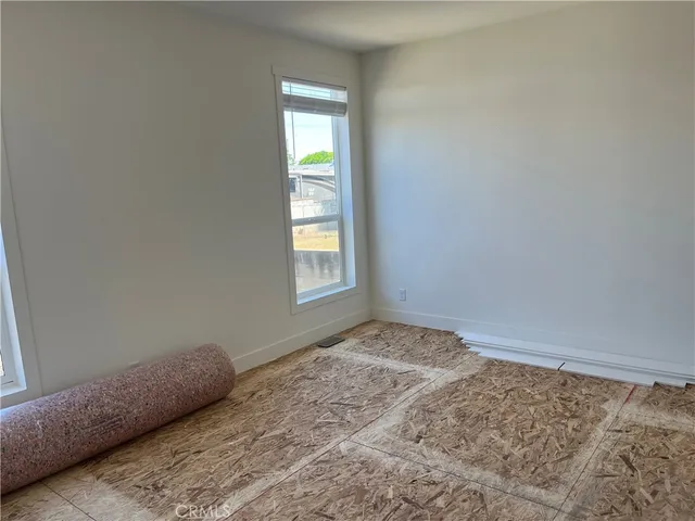 a view of a room with a sink and a window