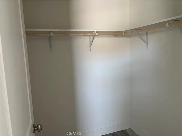 a bathroom with a granite countertop shower