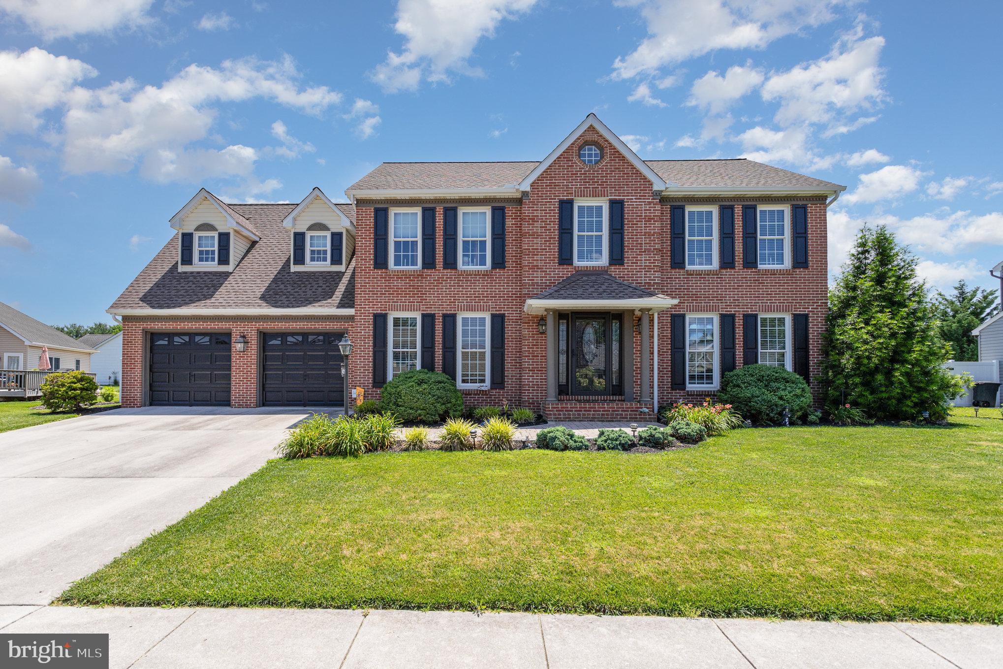 421 Dart Drive Hanover, PA 17331 - Photo 1 of 42 a front view of a house with garden