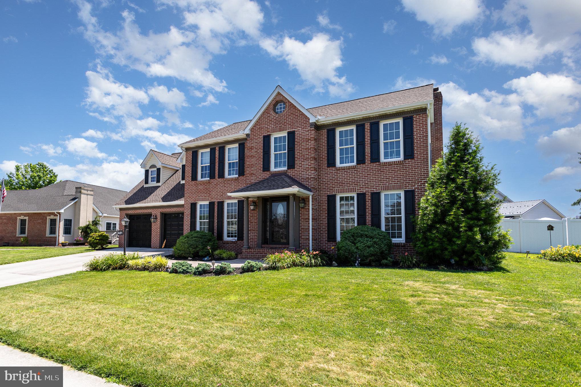 421 Dart Drive Hanover, PA 17331 - Photo 3 of 42 a front view of a house with a yard