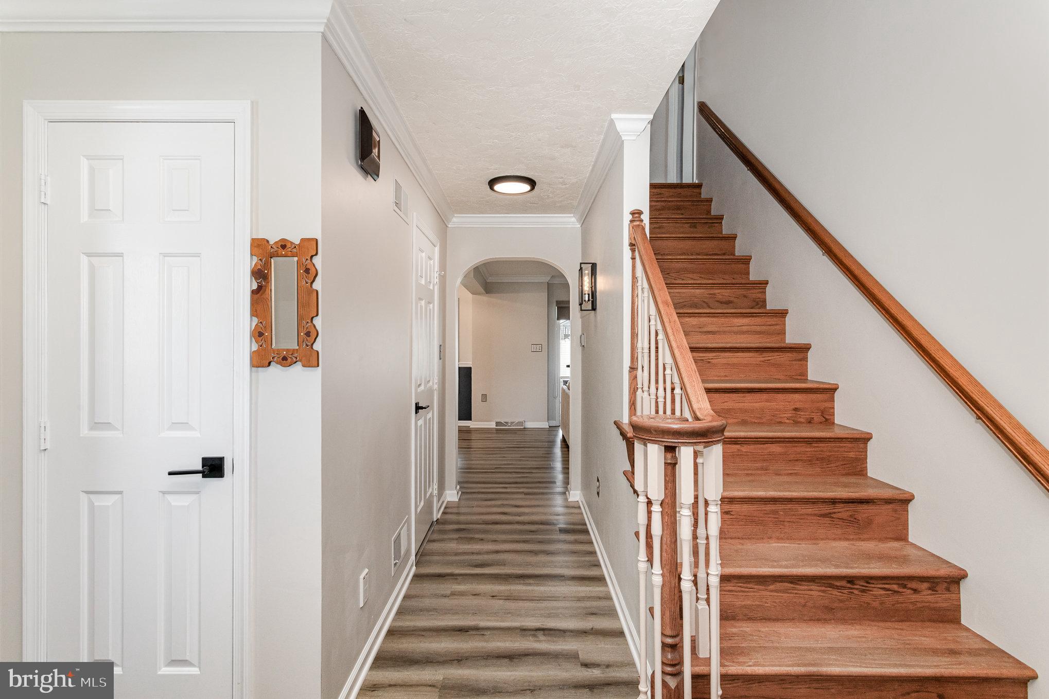 421 Dart Drive Hanover, PA 17331 - Photo 6 of 42 a view of staircase with wooden floor and white walls