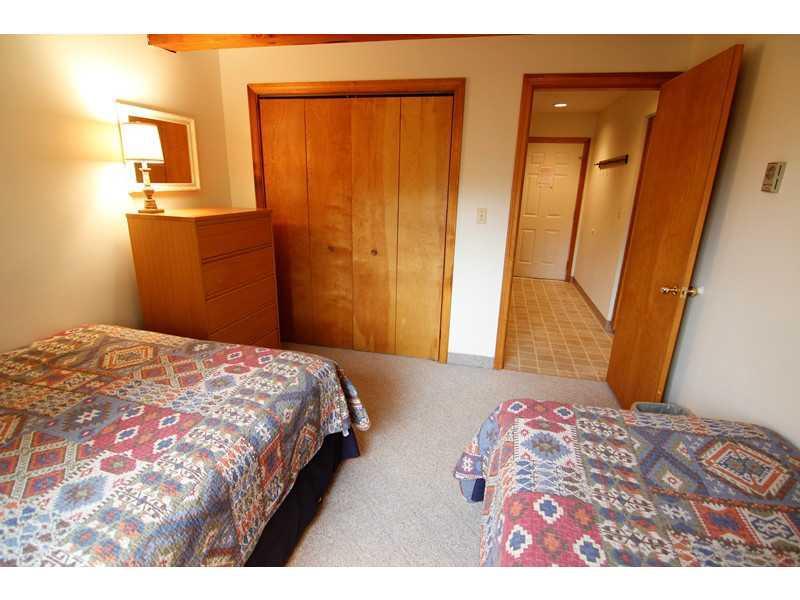 8 Moonstruck Drive, Unit B112 Newry, ME 04261 - Photo 9 of 15 Bedroom. Bedroom with large closet.