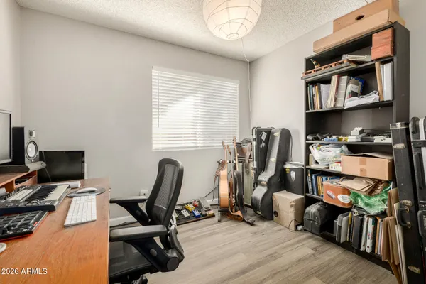 a backyard of a house with outdoor seating