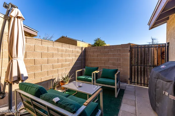 a outdoor living space with furniture