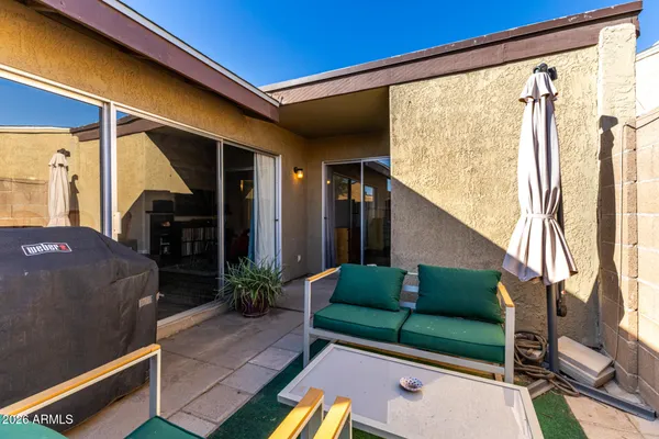 a outdoor living space with patio furniture