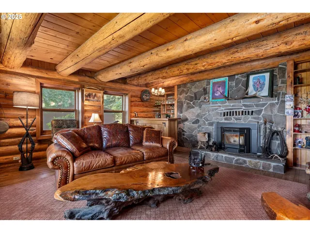 a view of a fireplace with furniture and fireplace