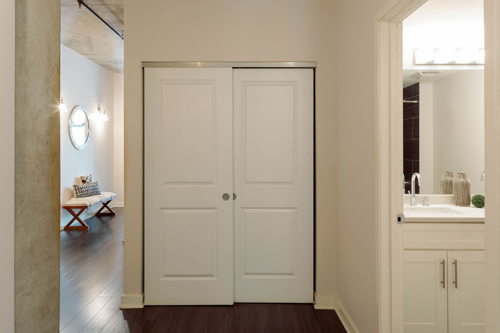 50 East 16th Street, Unit 402 Chicago, IL 60616 - Photo 11 of 33 a bathroom with a sink and a mirror