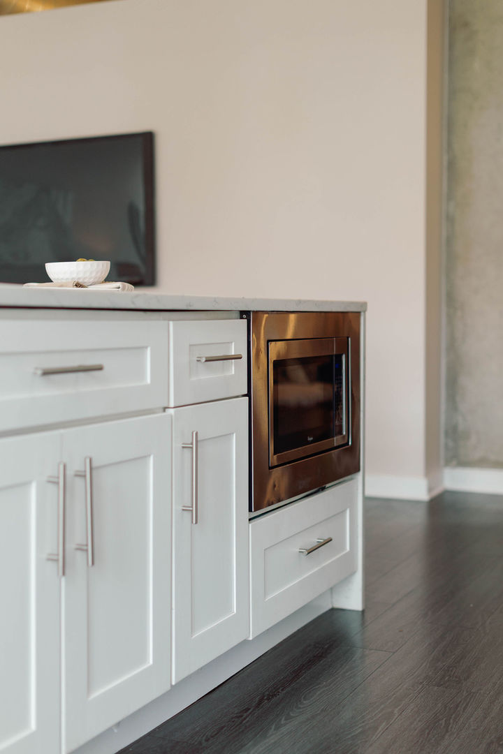 50 East 16th Street, Unit 402 Chicago, IL 60616 - Photo 17 of 33 a living room with hard wood floors and white cabinets