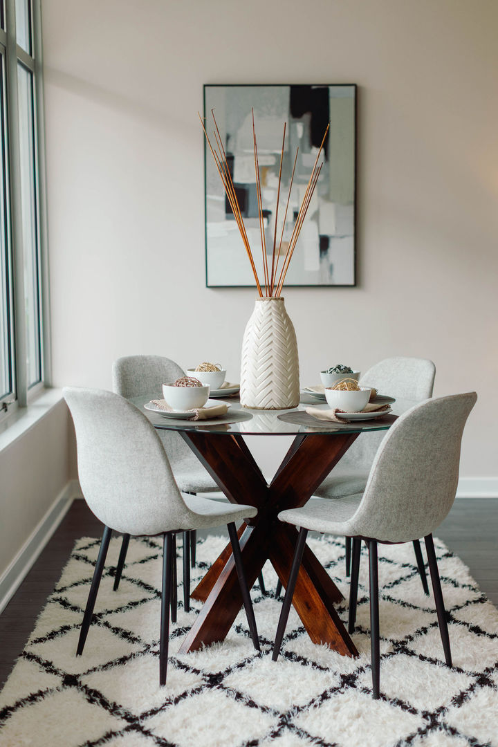 50 East 16th Street, Unit 402 Chicago, IL 60616 - Photo 20 of 33 a view of a dining room with furniture and wooden floor