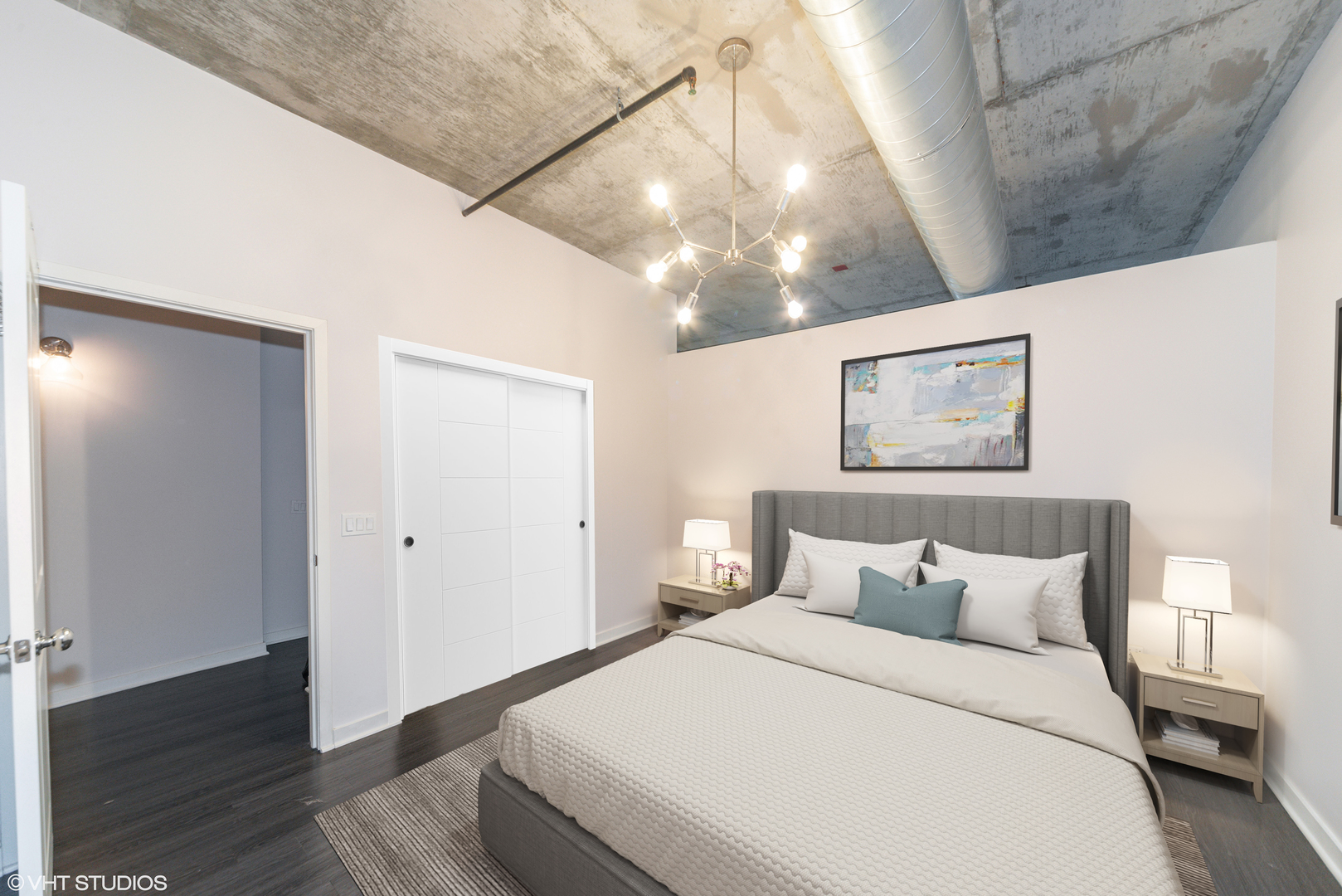 50 East 16th Street, Unit 402 Chicago, IL 60616 - Photo 28 of 33 a bedroom with a bed and wooden floor