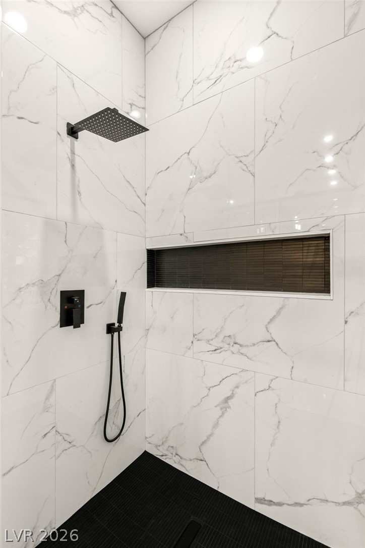 2104 Inverness Drive Henderson, NV 89074 - Photo 31 of 51 Full bathroom featuring a marble finish shower