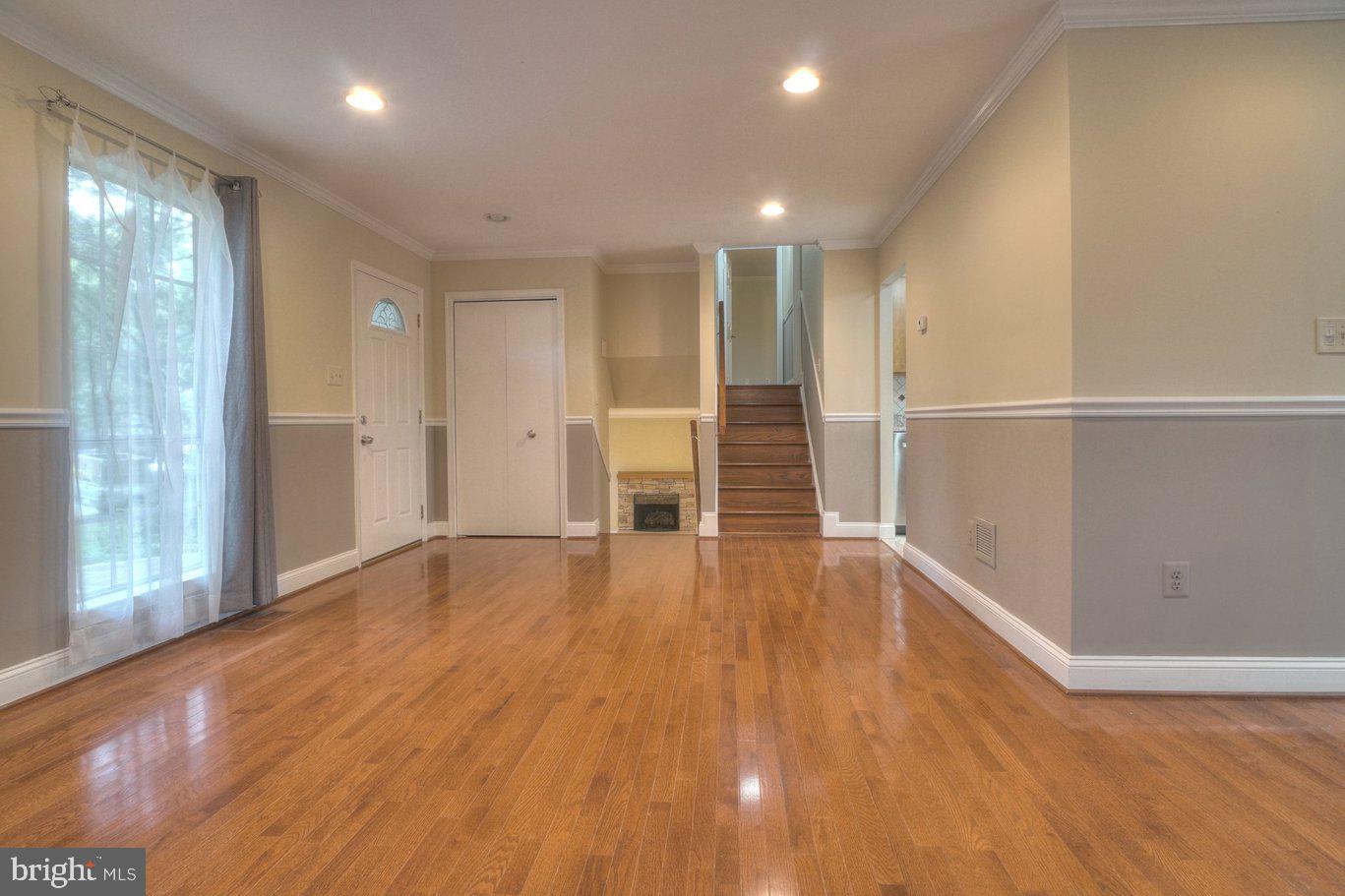 2405 Earlsgate Court Reston, VA 20191 - Photo 51 of 56 Spacious entryway with warm tones.