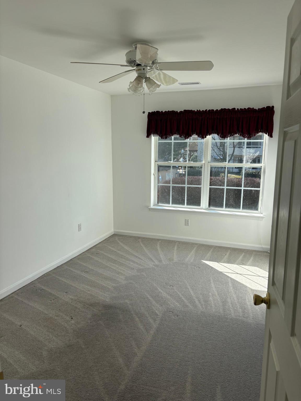 9228 Blue Grass Road, Unit 4 Philadelphia, PA 19114 - Photo 12 of 17 a view of a house with a window