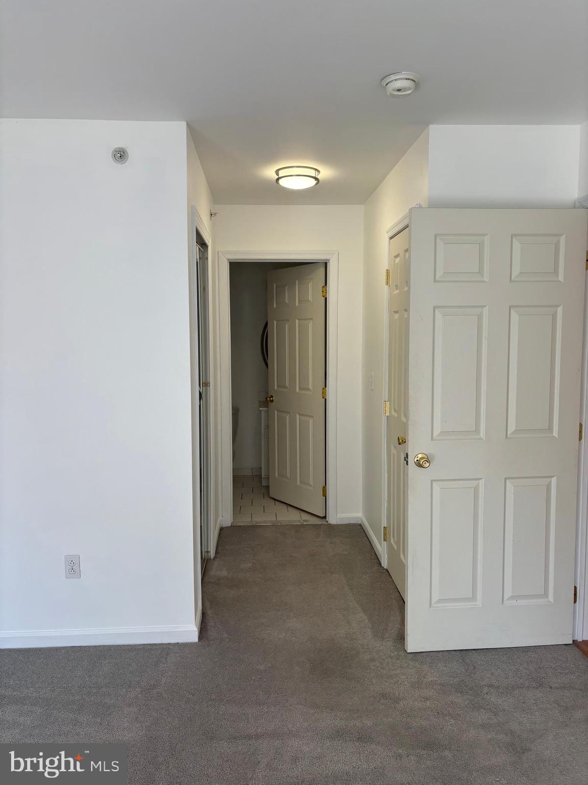 9228 Blue Grass Road, Unit 4 Philadelphia, PA 19114 - Photo 17 of 17 an empty room with windows