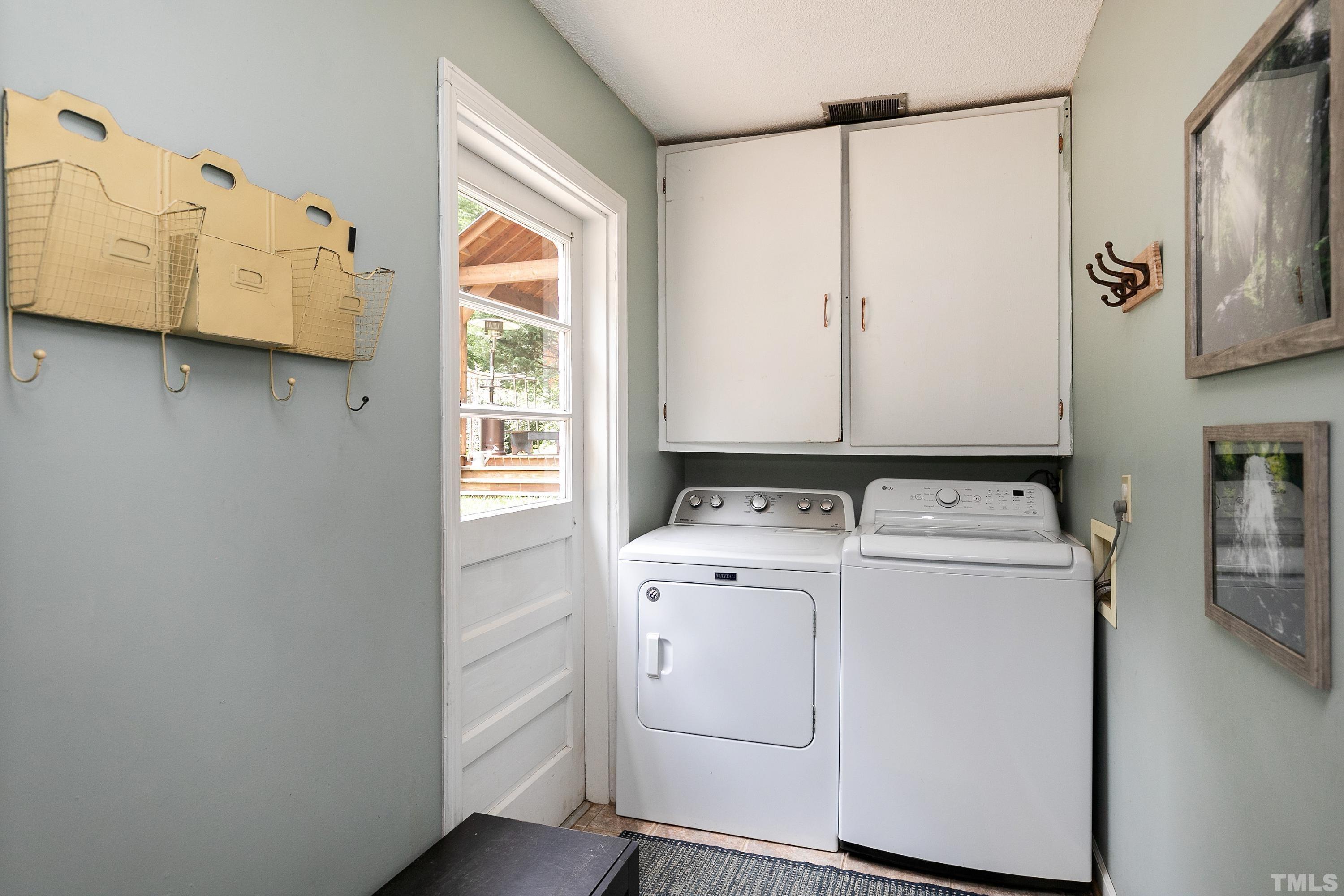 1300 Kingston Ridge Road Cary, NC 27511 - Photo 24 of 40 a utility room with dryer and washer