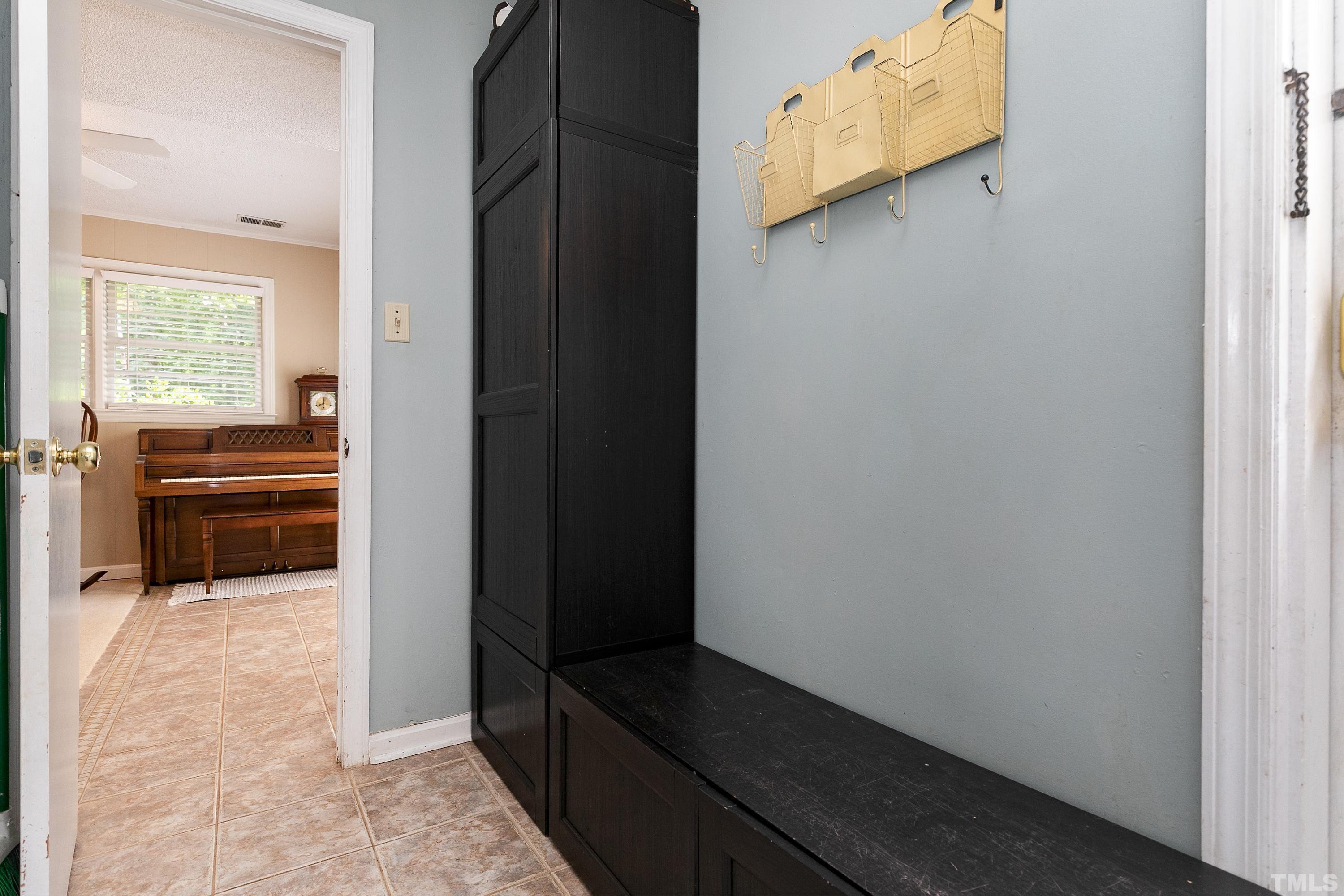 1300 Kingston Ridge Road Cary, NC 27511 - Photo 25 of 40 a view of kitchen with wooden floor and cabinets
