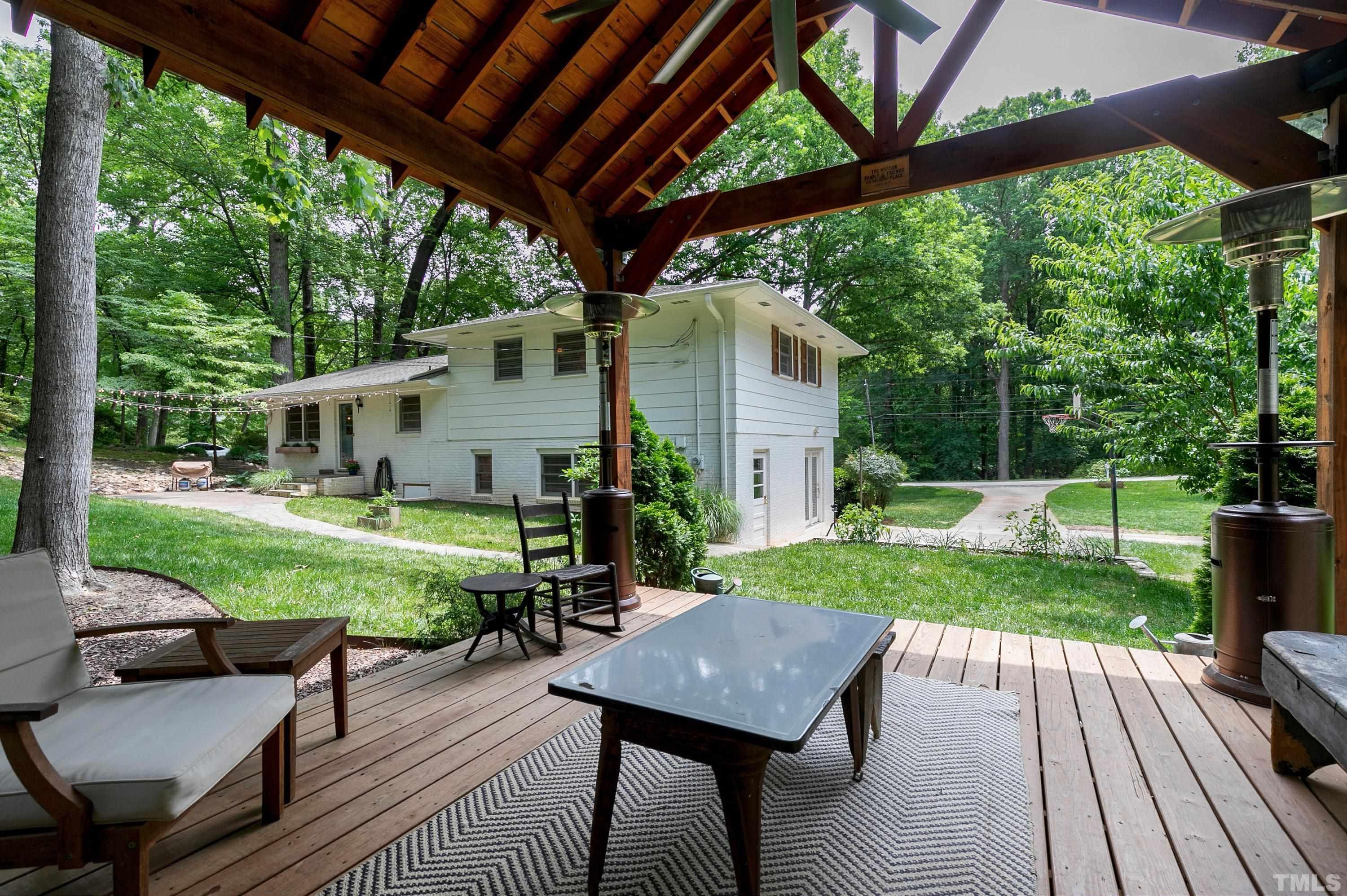 1300 Kingston Ridge Road Cary, NC 27511 - Photo 30 of 40 a view of a house with backyard and a sitting area