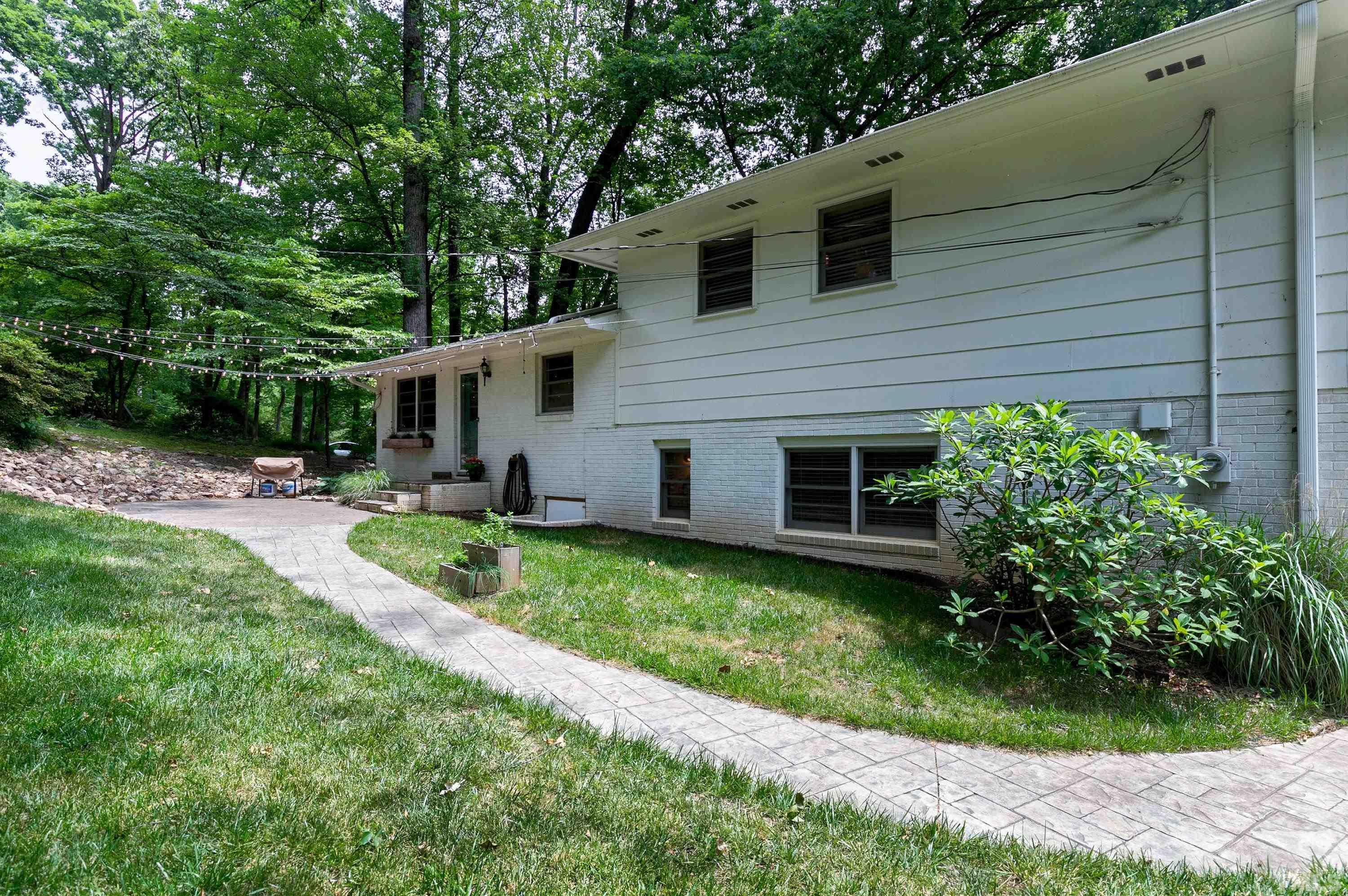 1300 Kingston Ridge Road Cary, NC 27511 - Photo 33 of 40 a backyard of a house with seating space