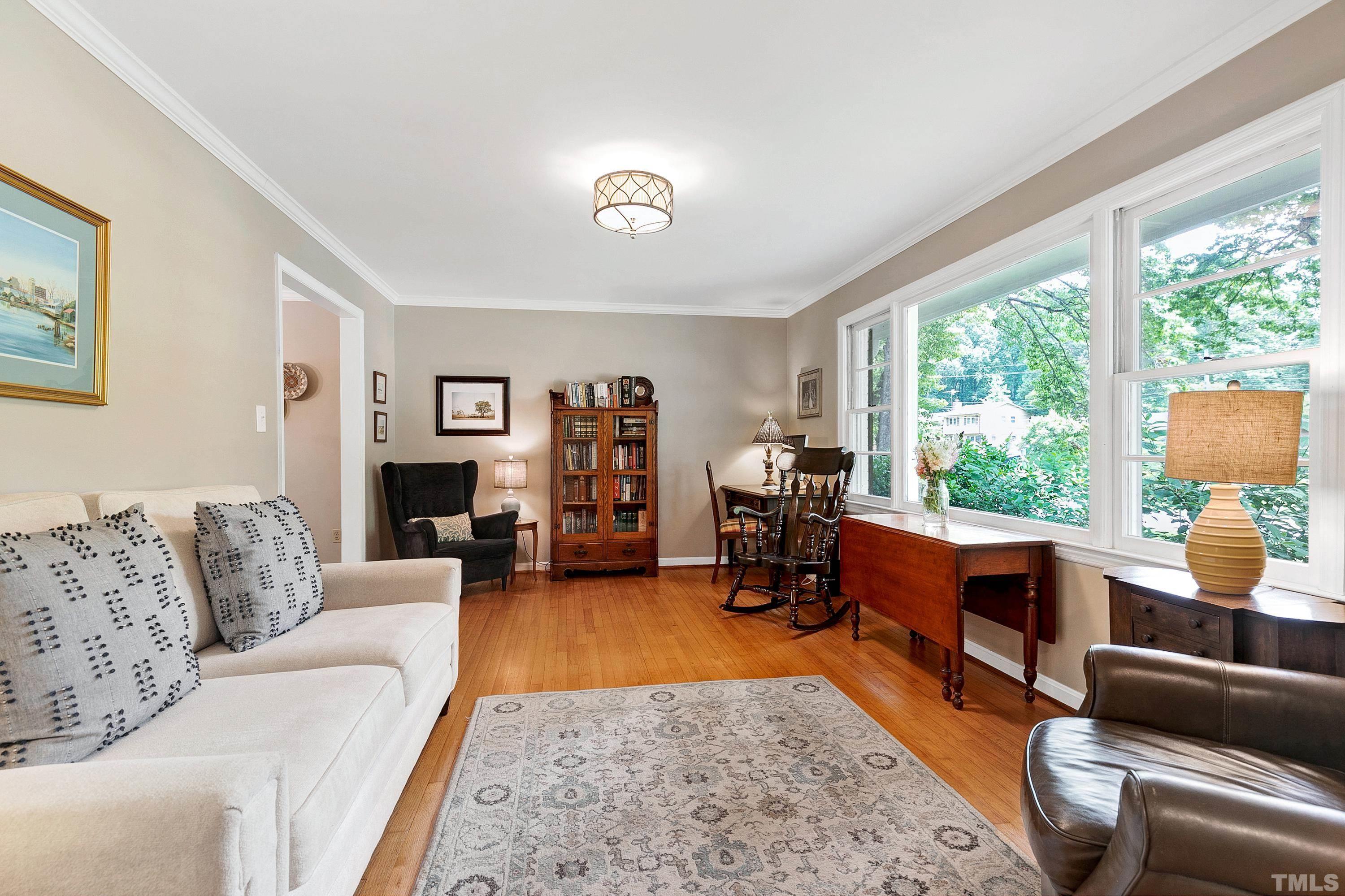 1300 Kingston Ridge Road Cary, NC 27511 - Photo 4 of 40 a living room with furniture and a large window