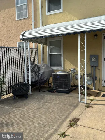 a view of a balcony with door