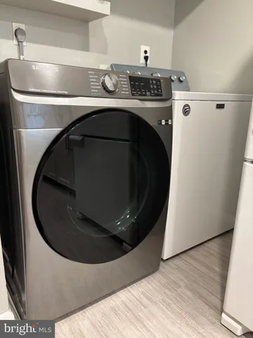 a utility room with washer and dryer
