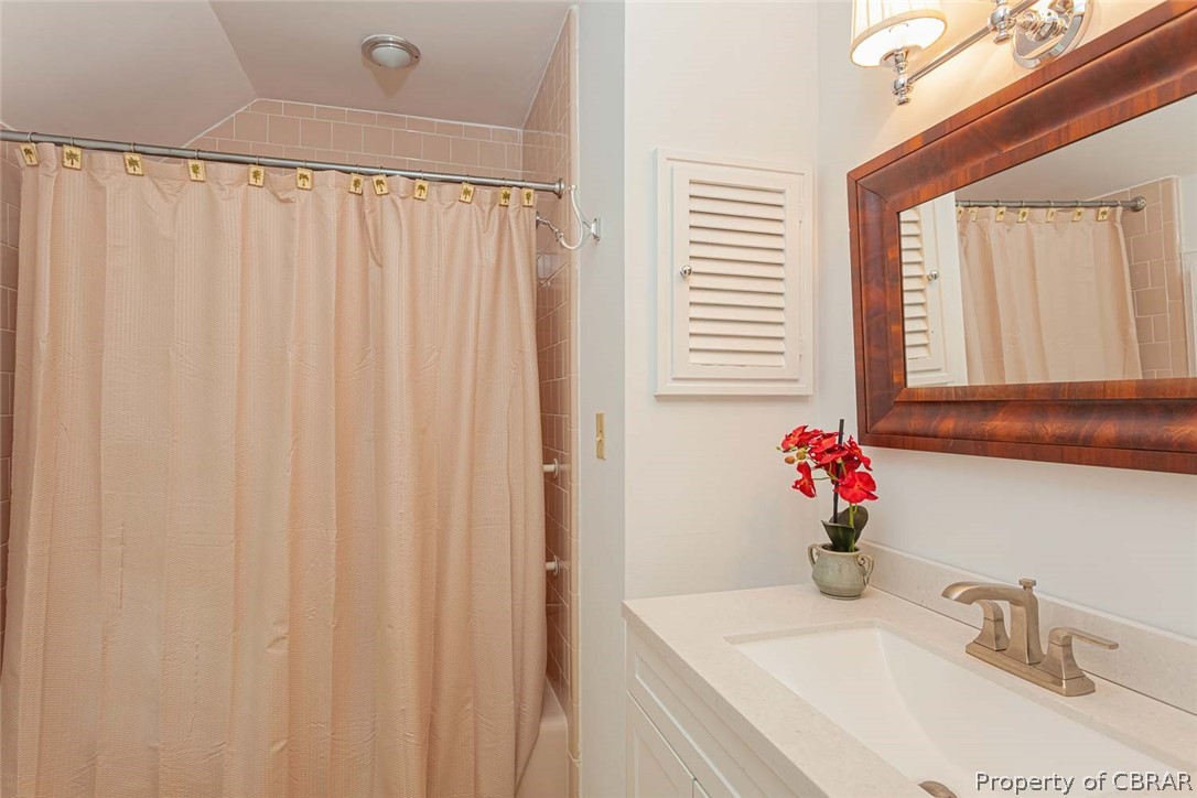 906 Blueberry Point Road White Stone, VA 22578 - Photo 24 of 47 Family Room Bathroom - New tile floors, new vanity & toilet with shower/tub combo.