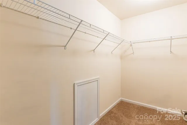 a view of a room with racks on the wall