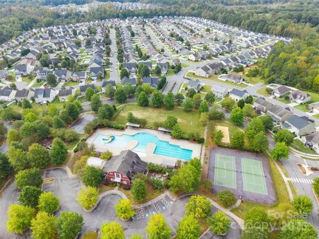 a view of swimming pool with a patio