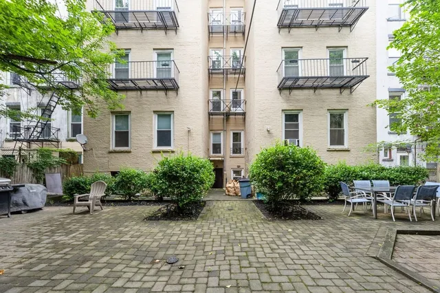 a picture of a book and a white wall