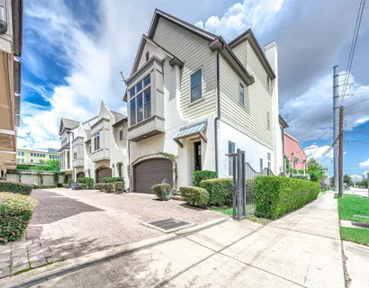 a view of a building with a street