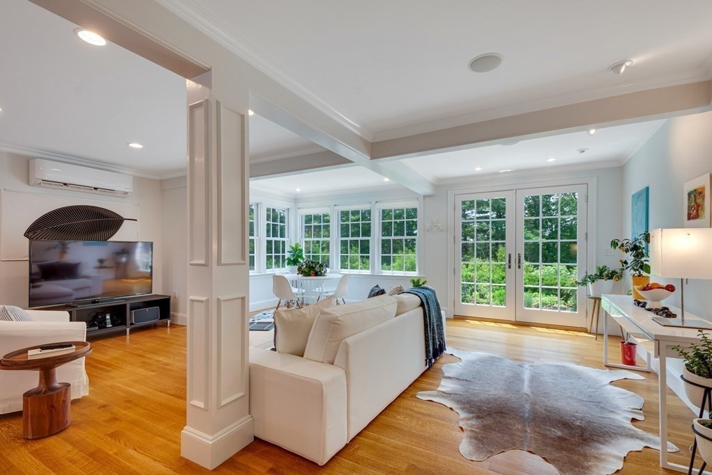 35 Sandy Pond Road Lincoln, MA 01773 - Photo 12 of 40 a living room with furniture and a large window