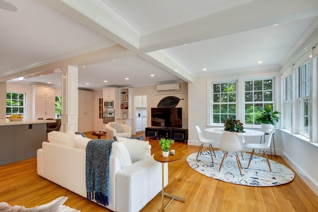 35 Sandy Pond Road Lincoln, MA 01773 - Photo 13 of 40 a living room with fireplace furniture and a large window