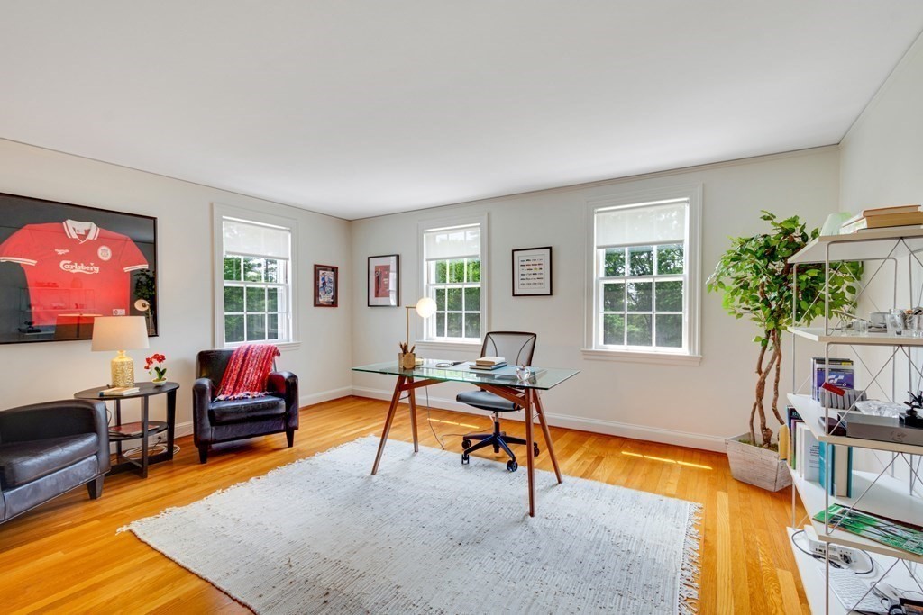 35 Sandy Pond Road Lincoln, MA 01773 - Photo 20 of 40 a living room with furniture and a potted plant