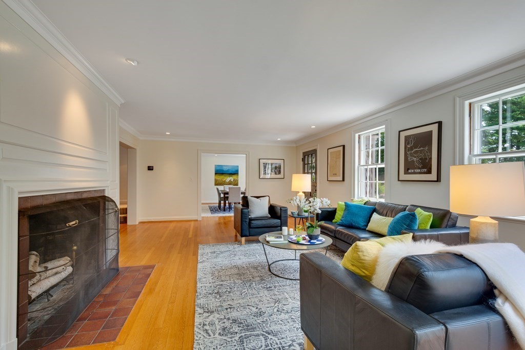 35 Sandy Pond Road Lincoln, MA 01773 - Photo 2 of 40 a living room with furniture and a fireplace