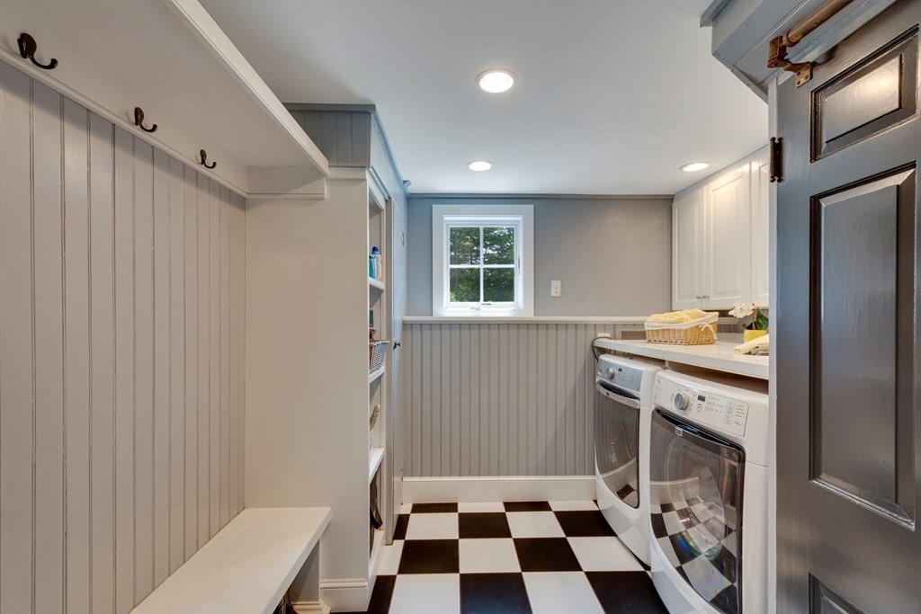 35 Sandy Pond Road Lincoln, MA 01773 - Photo 27 of 40 a kitchen with a sink a refrigerator a washer and dryer
