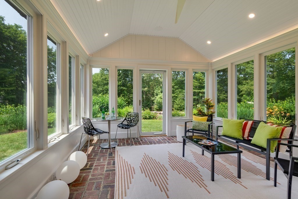 35 Sandy Pond Road Lincoln, MA 01773 - Photo 29 of 40 a living room with furniture and windows