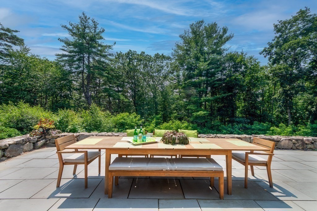 35 Sandy Pond Road Lincoln, MA 01773 - Photo 30 of 40 a view of yard with a table and chairs