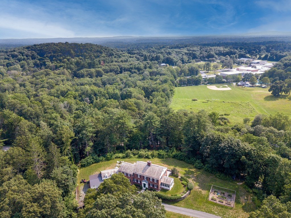 35 Sandy Pond Road Lincoln, MA 01773 - Photo 36 of 40 an aerial view of residential houses with outdoor space and lake view