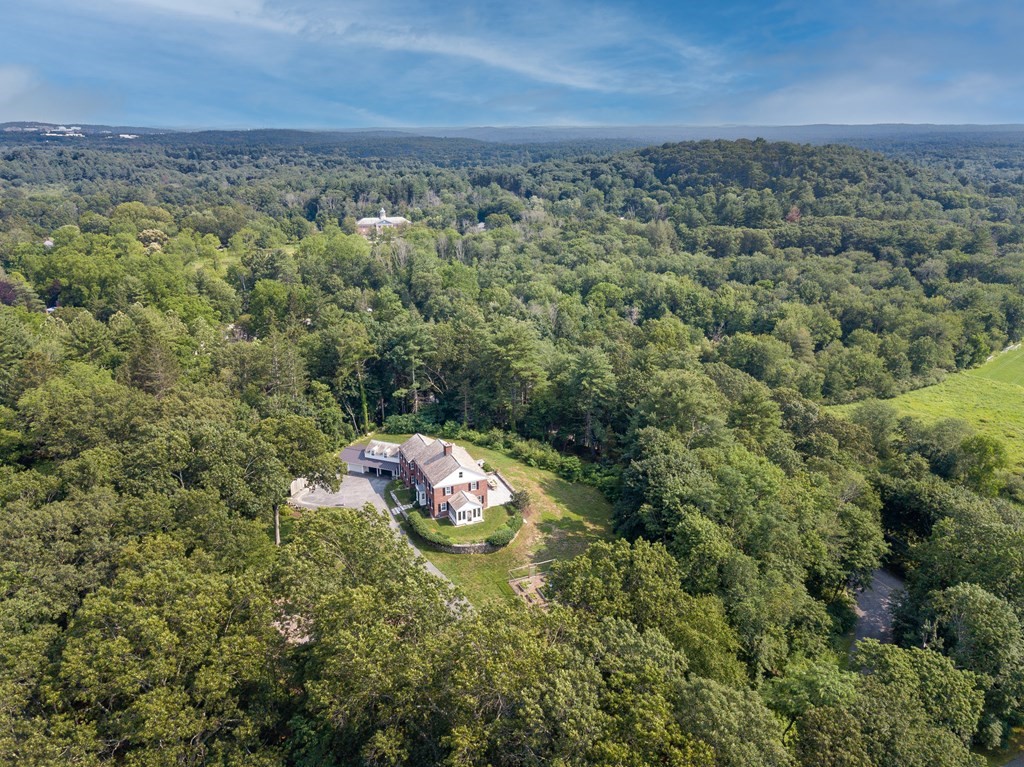 35 Sandy Pond Road Lincoln, MA 01773 - Photo 37 of 40 an aerial view of a house with a yard