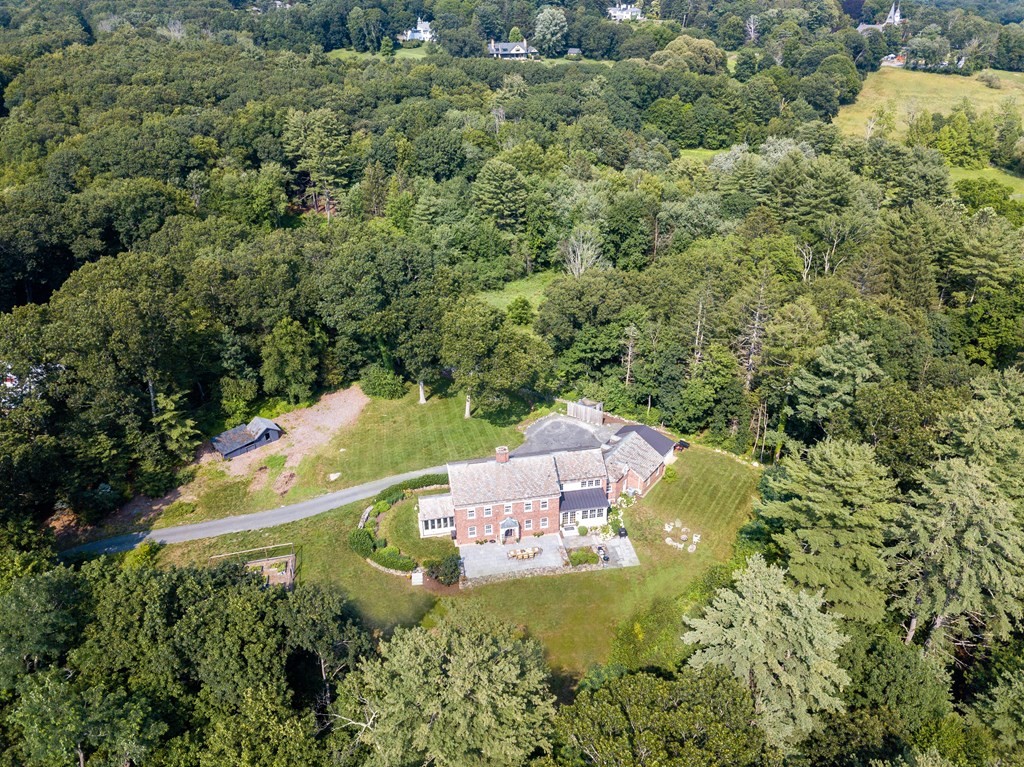 35 Sandy Pond Road Lincoln, MA 01773 - Photo 38 of 40 an aerial view of a house with a yard